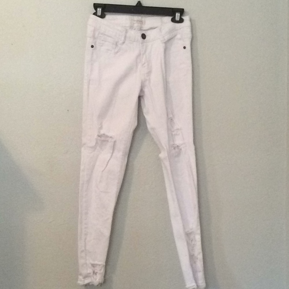 White ripped jeans